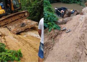 Durante travessia, escavadeira cai de caminhão em ponte de Novo Progresso