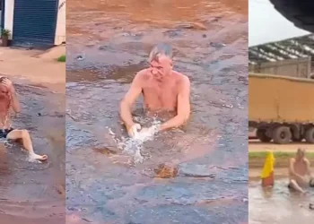 Homem resolve protestar tomando banho com água jorrada por cratera, no Pará. — Foto: Redes Sociais